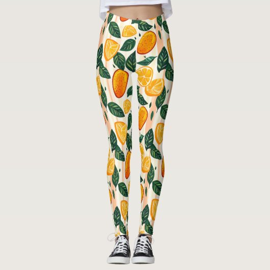 Lebhaftes Zitrusfrüchtemuster mit grünen Blätter Leggings (Vorderseite)