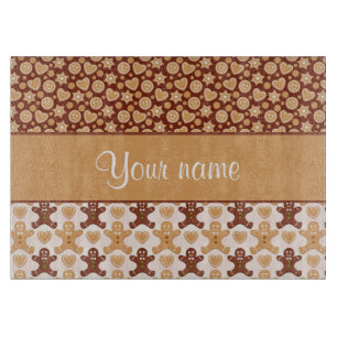 Lebkuchen-Mann-Gesichter und Herzen Schneidebrett