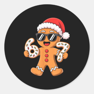Lebkuchen-Weihnachtsmann mit Sonnenbrille hält 67 Runder Aufkleber