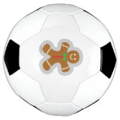 Lebkuchenmann, der den Engel im Schnee bildet Fußball (Gedreht)