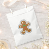 Lebkuchenmann, der den Engel im Schnee bildet Geschenktütchen (Ausgeschnitten)