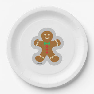 Lebkuchenmann, der den Engel im Schnee bildet Pappteller