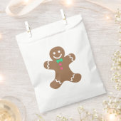 Lebkuchenmann mit grünen Krawatten und rosa Tasten Geschenktütchen (Ausgeschnitten)