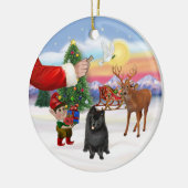 Leckerei für einen Schwarzen Spitz Keramikornament (Links)