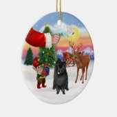 Leckerei für einen schwarzen Spitz Keramikornament (Rechts)