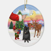 Leckerei für einen schwarzen Spitz Keramikornament (Links)