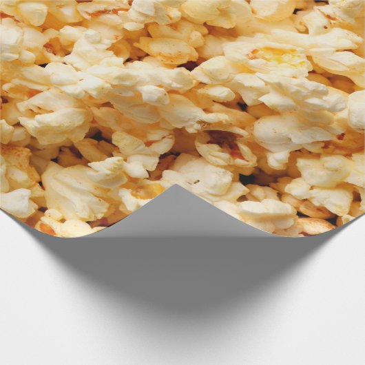 Leckeres Popcorn auf dem ganzen Hintergrund. Essen Geschenkpapier (Ecke)