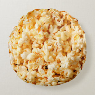 Leckeres Popcorn auf dem ganzen Hintergrund. Essen Rundes Kissen