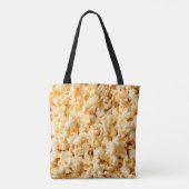 Leckeres Popcorn auf dem ganzen Hintergrund. Essen Tasche (Rückseite)