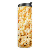 Leckeres Popcorn auf dem ganzen Hintergrund. Essen Thermosbecher (Nach links gedreht)