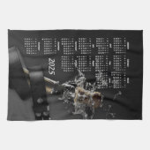 Ledergürtel & Champagner Flasche 2025 Kalender Geschirrtuch (Horizontal)