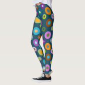 Leggings in farbenfrohen Punkten auf dunkelblau (Links)