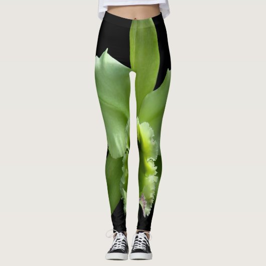 Leggings mit grüner Orchidee auf schwarzem Hinterg (Vorderseite)