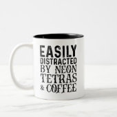 Leicht abgelenkt durch Neontetras und Kaffee Zweifarbige Tasse (Links)