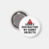 Leicht ablenkbar durch glänzende Objekte Magnet (Vorderseite/Rückseite)