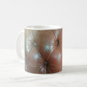 Leicht auf brauner Ledersofa-Oberfläche, textureab Kaffeetasse (Vorderseite Links)