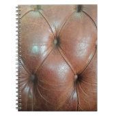 Leicht auf brauner Ledersofa-Oberfläche, textureab Notizblock (Vorderseite)