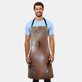 Leicht auf brauner Ledersofa-Oberfläche, textureab Schürze (Getragen)