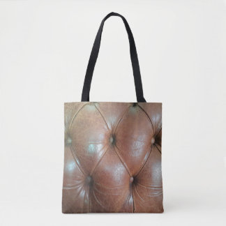 Leicht auf brauner Ledersofa-Oberfläche, textureab Tasche