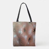 Leicht auf brauner Ledersofa-Oberfläche, textureab Tasche (Rückseite)