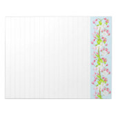 Leichte Feder auf einem großen Notepad Notizblock (Vorderseite)