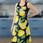 Lemon Monogram Citrus Navy Blue Schürze<br><div class="desc">Diese Monogramm-Schürze weist ein botanisches Zitronenmuster auf,  mit einem Marineband und einem Quadrat für den Anfang oben.</div>