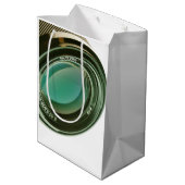 Lens van een fotocamera, een scherpe blik. mittlere geschenktüte (Rückseite Schrägansicht)