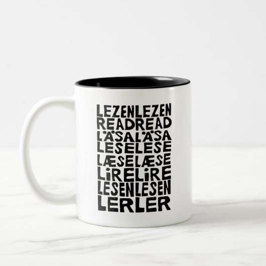 Lesen Sie in 8 Sprachen Lino Print Tasse (Links)