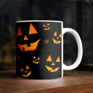 Leuchtende Jack-O-Lantern-Gesichter zum Halloween- Kaffeetasse