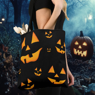 Leuchtende Jack-O-Lantern-Gesichter zum Halloween- Tasche