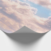 Leuchtende rosafarbene Wolken in einem blauen Himm Geschenkpapier (Ecke)