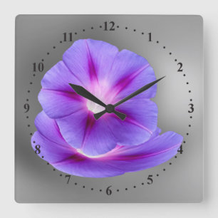 leuchtende violette Blumen Quadratische Wanduhr