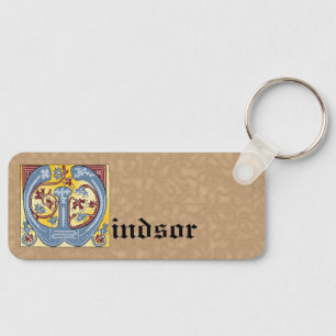 Leuchtender rechteckiger, blauer und roter Buchsta Schlüsselanhänger