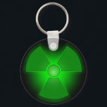 Leuchtendes grün leuchtendes Symbol für Radioaktiv Schlüsselanhänger<br><div class="desc">Dieses grüne Piktogramm ist das Symbol für Radioaktivität. Radioaktivität wird zur Stromerzeugung in Power-Pflanze verwendet. Strahlung ist für Mensch und Tier tödlich. Natürlich ist dieser Gegenstand nicht gefährlich... Es ist nur ein Witz.</div>