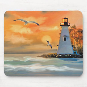Leuchtturm bei Sonnenuntergang über dem Ozean und Mousepad