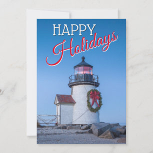 Leuchtturm mit einem Weihnachtskranz Feiertagskarte