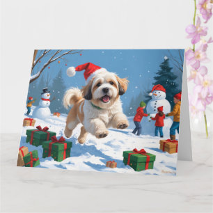 Lhasa Apso läuft in Snow mit Weihnachtshut Karte