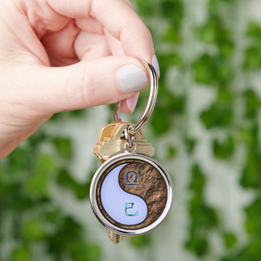 Libra & Earth Snake Schlüsselanhänger (Hand)