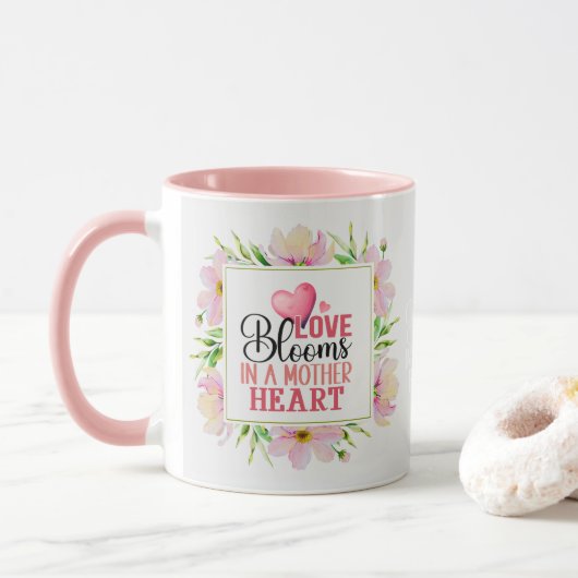 "Liebe blüht in einem Mutterherzen" Florales Rosa Tasse (Mit Donut)