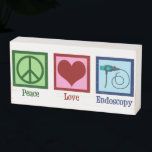 Liebe Endoskopie Holzkisten Schild<br><div class="desc">Peace Liebe Endoskopie. Ein niedliches Geschenk mit einem Friedensschild,  Herz und Endoskop,  das in medizinischen Verfahren zur Aufnahme eines Patienten verwendet wird.</div>