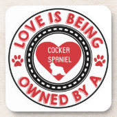 Liebe gehört einem Cocker Spaniel Getränkeuntersetzer (Vorderseite)
