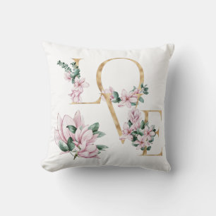 Liebe in Goldbrief mit magnolischen Blume Kissen