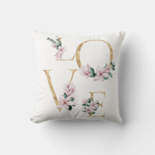 Liebe in Goldbrief mit magnolischen Blume Kissen