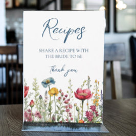 Liebe in Wildblumen mit blutfarbenem Wasser