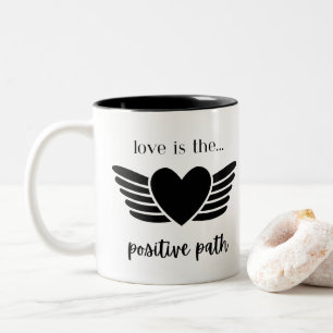 LIEBE IST DIE POSITIVE PFAD-TASSE ZWEIFARBIGE TASSE