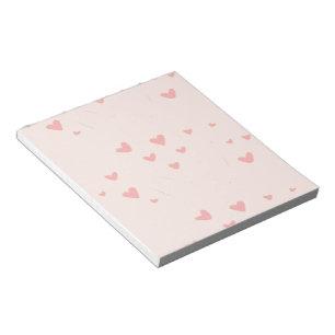 Liebe ist in den rosa Herzen Notizblock