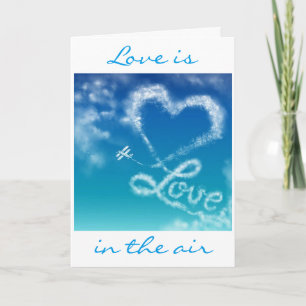 **LIEBE** IST IN DER LUFT AUF UNSEREM **1. JAHRESZ FEIERTAGSKARTE