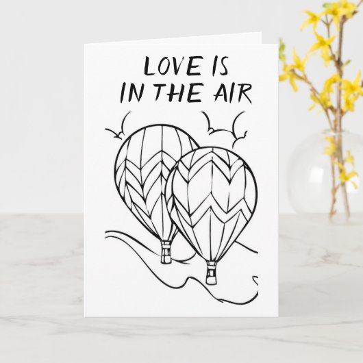 **LIEBE** IST IN DER LUFT **AUF UNSERER JAHRESKART KARTE (Gelbe Blume)