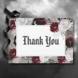 Liebe & Knochen Hochzeit mit Roter Flora Dankeskarte<br><div class="desc">Enthüllt die Verzauberung ewiger Liebe mit unserer spöttischen Hochzeitskarte. Erleben Sie den weltlichen Reiz dieses blutroten und geistreichen, blühenden, weißen Aquarellbildes, das in das göttliche Greifen der skelettalen Hände geknallt ist und eine Geschichte zeitloser Romantik flüstert. Der ätherische Hintergrund, berührt mit einem geistreichen Unschärfe, Set die Bühne für eine Feier,...</div>