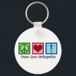 Liebe Orthopädie Schlüsselanhänger<br><div class="desc">Peace Liebe Orthopädie. Ein niedliches Weihnachtsgeschenk für einen orthopädischen Chirurgen oder Orthopäden,  der mit dem Muskel-Skelett-System arbeitet und Patienten,  die Schulter und angesagte Operation benötigen. Ein Friedenszeichen,  ein Herz und ein Skelett.</div>